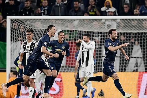 Substitute Juan Mata (right) made an instant impact as he scored the equaliser for Manchester United