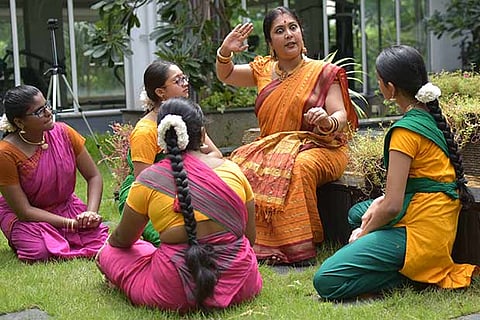 Gayatri (second from right) with disciples