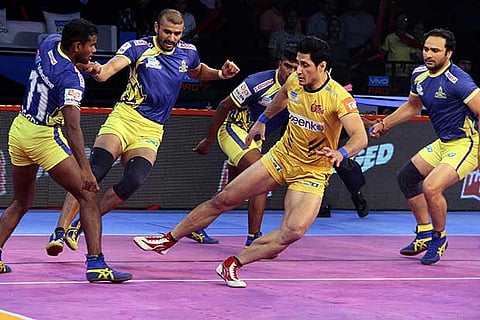 Telugu Titans? Rahul Chaudhari goes for a raid against Tamil Thalaivas in the Pro Kabaddi League on Tuesday