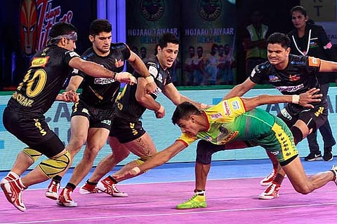Telugu Titans? Iranian trio (left) in action against Patna Pirates during the sixth edition of PKL