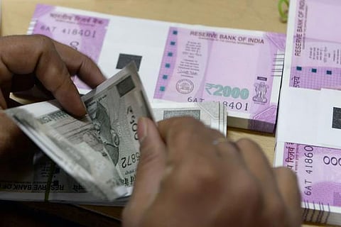Rupee breaks 7-day winning run, down 18 paise at 70.87 a dollar