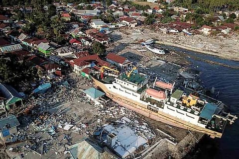 Indonesia steps up race to find survivors as quake toll passes 1,200