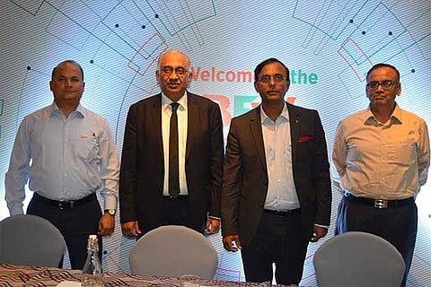 Ravi Raghavan, MD (2nd right) with officials