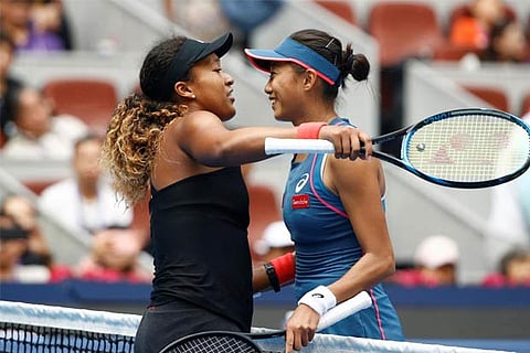 Emotional Osaka battles past Zhang into Beijing semis