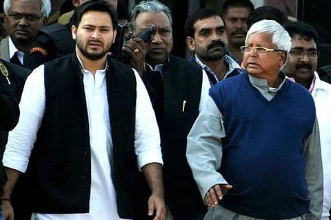 RJD leader Lalu Prasad Yadav and his son Tejashwi Yadav