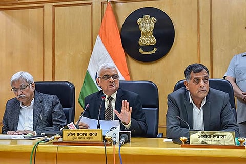 CEC OP Rawat, Election Commissioners Sunil Arora (L) and Ashok Lavasa (R) address a press conference