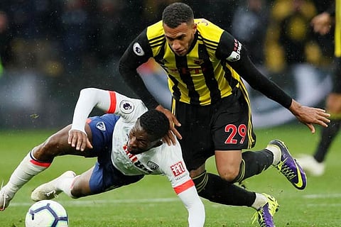 Watford's Etienne Capoue in action with Bournemouth's Jefferson Lerma