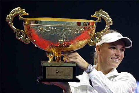 Wozniacki swats aside Sevastova to wear Beijing crown