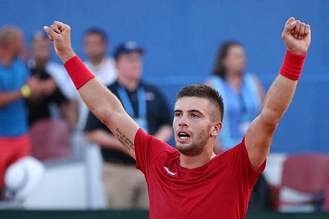 Croatia's Borna Coric celebrates winning his match against Frances Tiafoe of the US