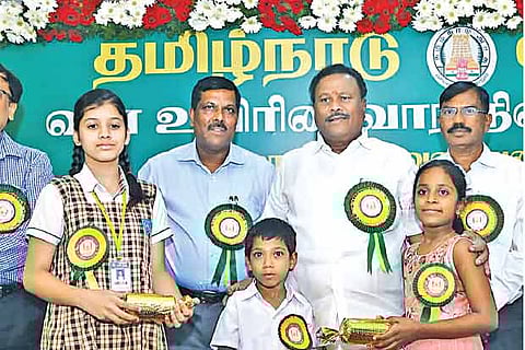 Forest Minister Srinivasan with the winners of the State-level competition in Chennai on Monday