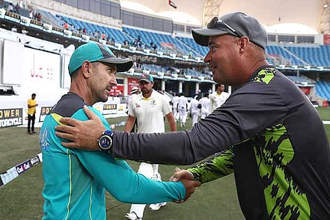 Rival coaches Justin Langer (left) and Mickey Arthur