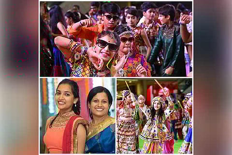 Garba dancers sporting sun glasses with the traditional attire; Manasi and her mother