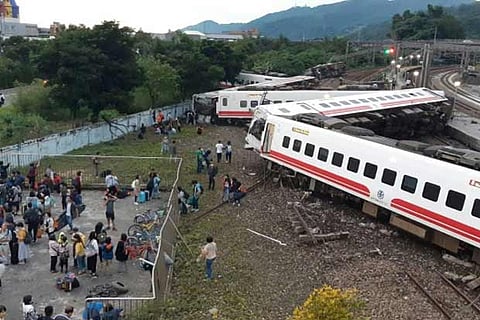 17 dead after train flips in Taiwan