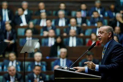 Turkish President Tayyip Erdogan addresses members of parliament from his ruling AK Party