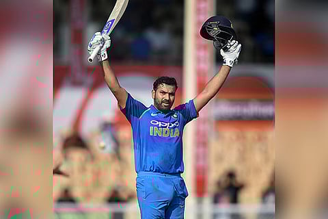 Rohit Sharma celebrates his century during the 4th ODI cricket match against West Indies