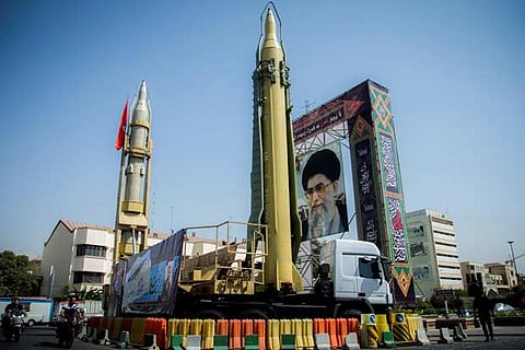 Display featuring missiles and a portrait of Iran's Supreme Leader Ayatollah Ali Khamenei in Tehran