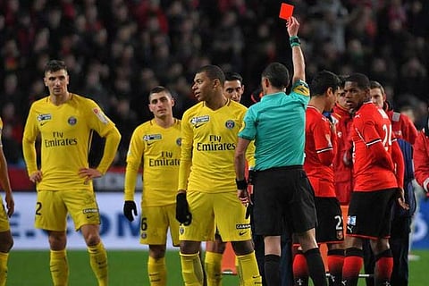 Kylian Mbappe was sent off for his reaction to a bad tackle during PSG's win over Nimes