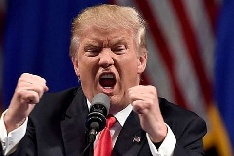 Trump ups ante on China, threatens duties on nearly all its imports