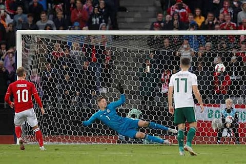 Denmark's Christian Eriksen scores their second goal from the penalty spot
