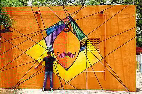 Cartoonist Biswajit and his artworks at Bharathiyar Park in Madurai | Representative Image