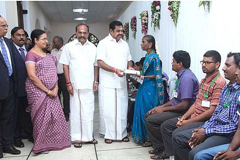 CM distributing job orders to differently-abled aspirants at the Secretariat on Friday