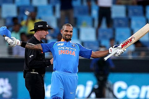 Dhawan celebrates scoring a century during the ODI match of Asia Cup between India and Hong Kong