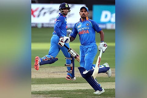 Shikhar Dhawan and Ambati Rayudu run between the wickets