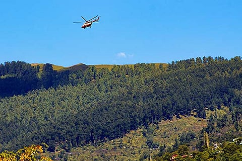 Kullu: An Indian Air Force helicopter flies towards Lahaul from Kullu to rescue stranded people