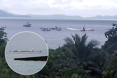 People are evacuated from an Air Niugini plane which crashed in waters in Weno, Chuuk, Micronesia