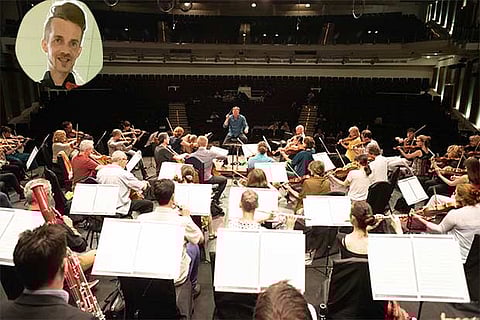 Inset: Adam Greig; picture from the performance