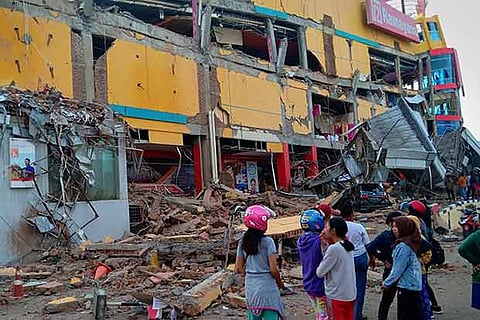 A damaged shopping mall is seen here after an earthquake hit Palu, Sulawesi Island, Indonesia