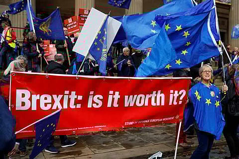 Anti-Brexit supporters demonstrate outside the conference centre at annual Labour Party Conference