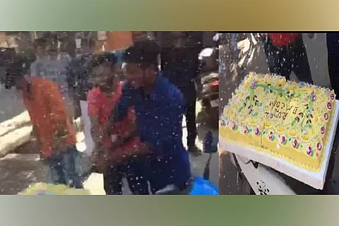 Students cutting the cake with machete in Tiruchy (left); the cake with ?Royal II M Com? written on it
