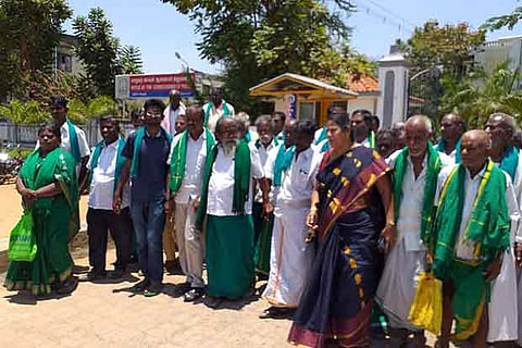 Ayyakkannu and farmers come out of the Commissioner of Police Office in Tiruchy on Tuesday