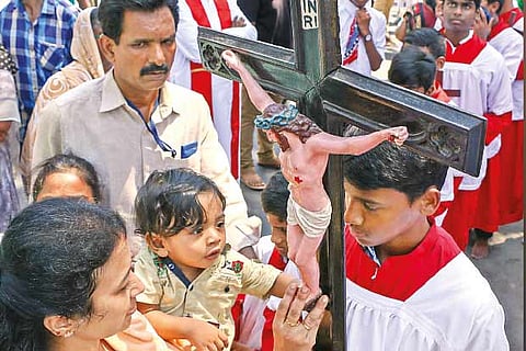 Good Friday, marking the crucifixion of Lord Jesus Christ, was observed with a procession by Christians