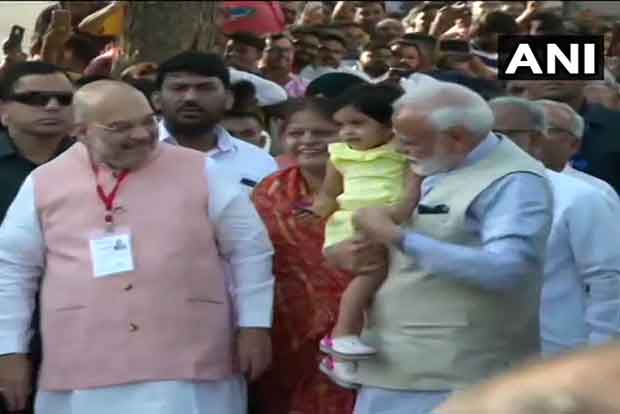 Shah casts vote in Guj, says every vote can take nation ahead