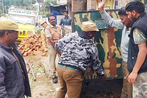 Forest department officials placed a cage after villagers urged them to trap the bears in Kotagiri