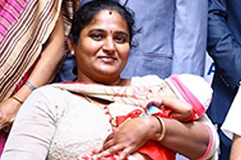 Gayatri with her baby