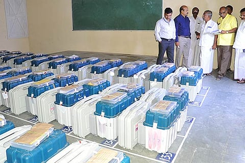 Officials and party representatives inspecting the counting centre in a private college in Wallajahpet