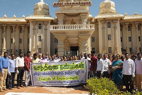 Members of Friends of Environment forum holding a banner after the inauguration at Tamil University