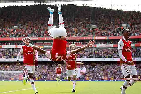 Pierre-Emerick Aubameyang celebrates after scoring the winning goal against Burnley at the Emirates Stadium