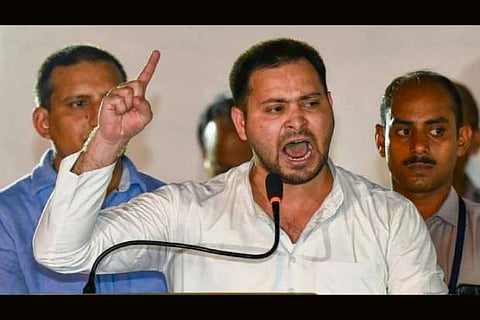 Tejashwi trains guns at JD-U leader for police officer's use of MLC's car
