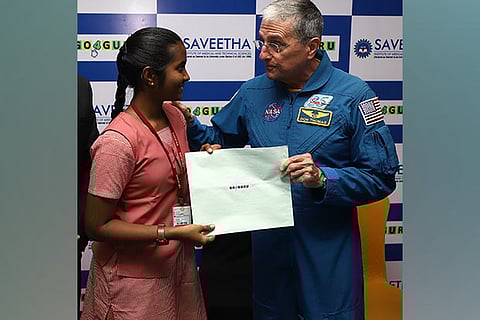 J Dhaanya Thasnem with former NASA Astronaut Don Thomas
