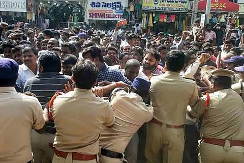 Protestors and police clash during a demonstration in Hyderabad on Saturday