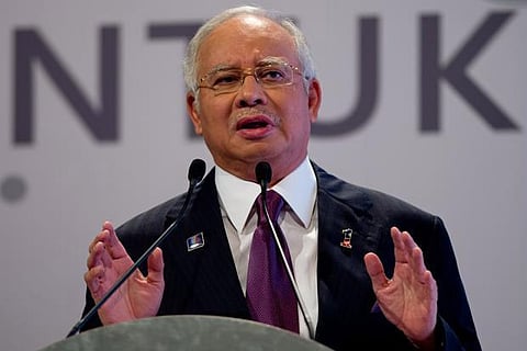 Malaysian ex-leader Najib takes stand in 1MDB trial