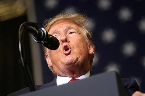 Trump calls Trudeau '2-faced' after palace gossip goes viral