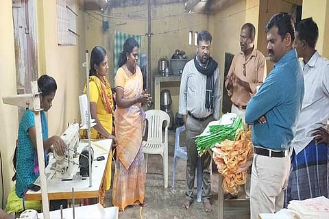 Anitha (in saree) at her bag stitching unit in Tiruvallur