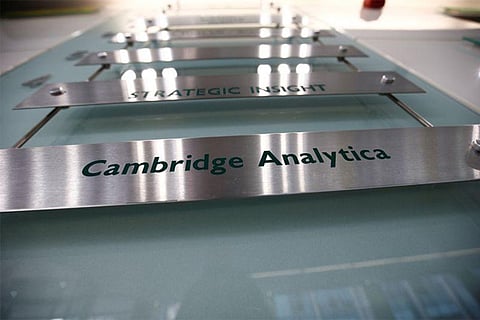 The nameplate of political consultancy, Cambridge Analytica, is seen in central London,