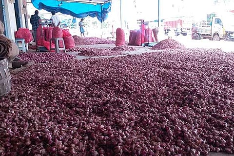 Onion loads from Nasik that arrived in Tiruchy market on Tuesday