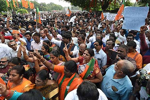 BJP supporters stage a counter demonstration for CAA protests in Chennai on Friday